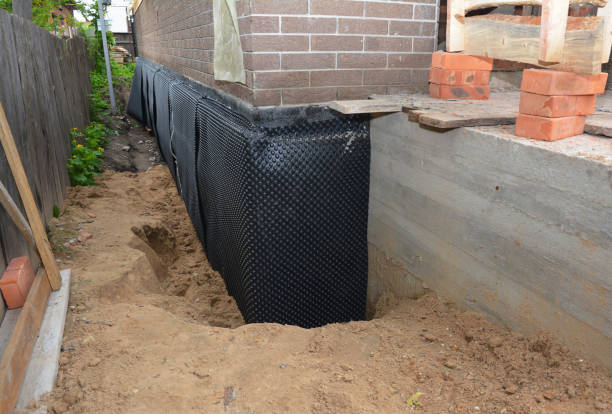 Happy homeowners after waterproofing job in Schooleys Mountain